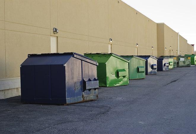 an arrangement of durable and robust disposal containers utilized on a construction project in Bedford Heights